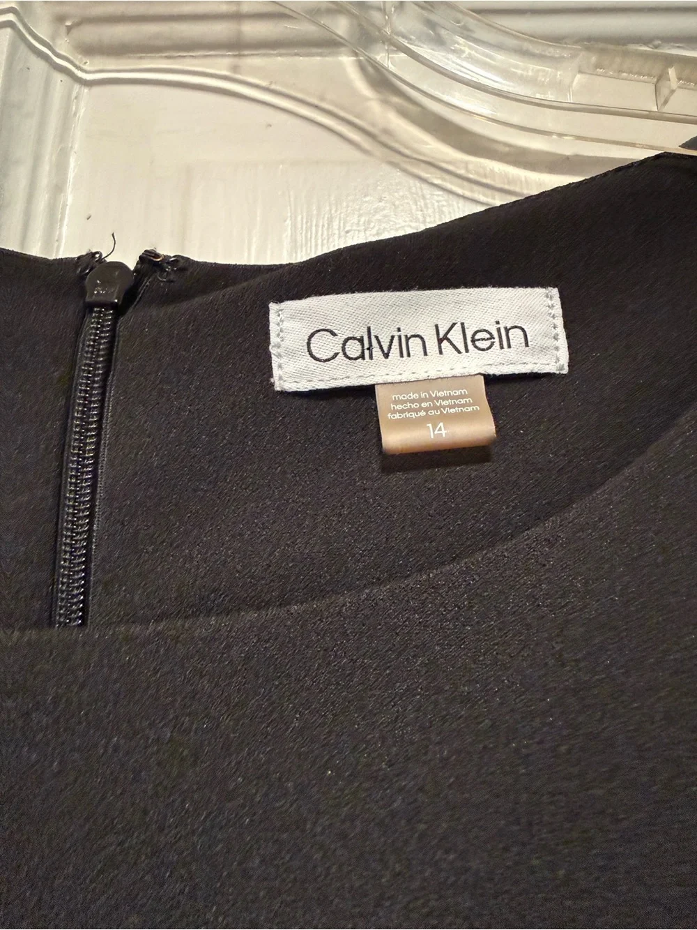 Calvin Klein Black Sleeveless Sheath Dress with Asymmetric Pleat Details